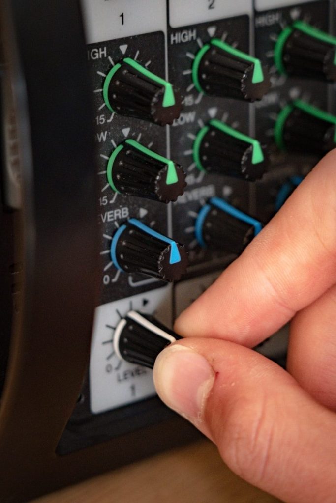 a hand holding a circuit board
