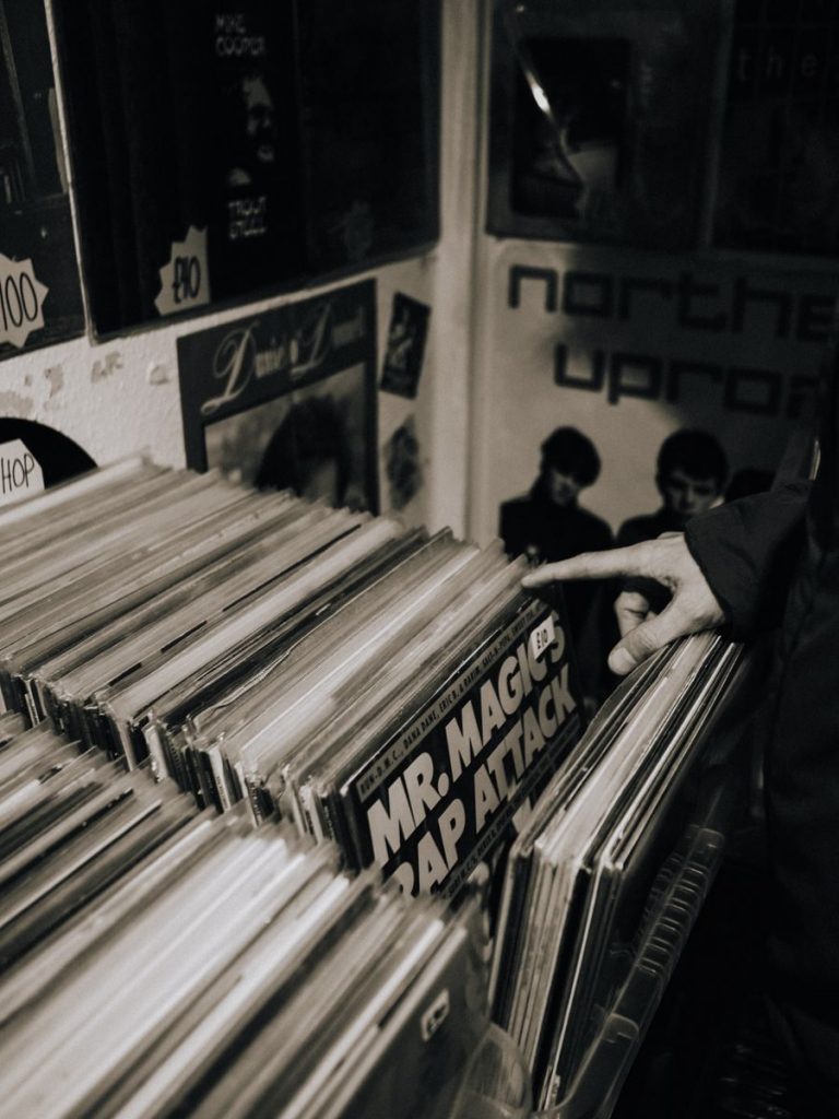 Explore vintage vinyl records in a cozy Abergele shop. Retro vibe.